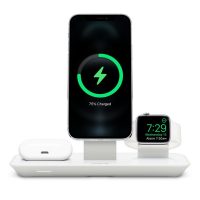 The stand offers dedicated wireless charging spots for iPhone, Apple Watch, and AirPods.